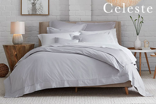 Image of bed with Sferra Celeste bed linens
