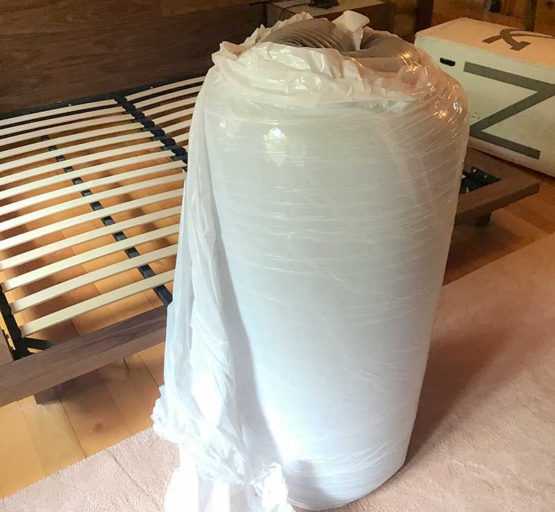 Mattress wrapped in plastic